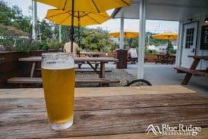 Glass of Beer on the outside patio of Whaley Farm Brewing