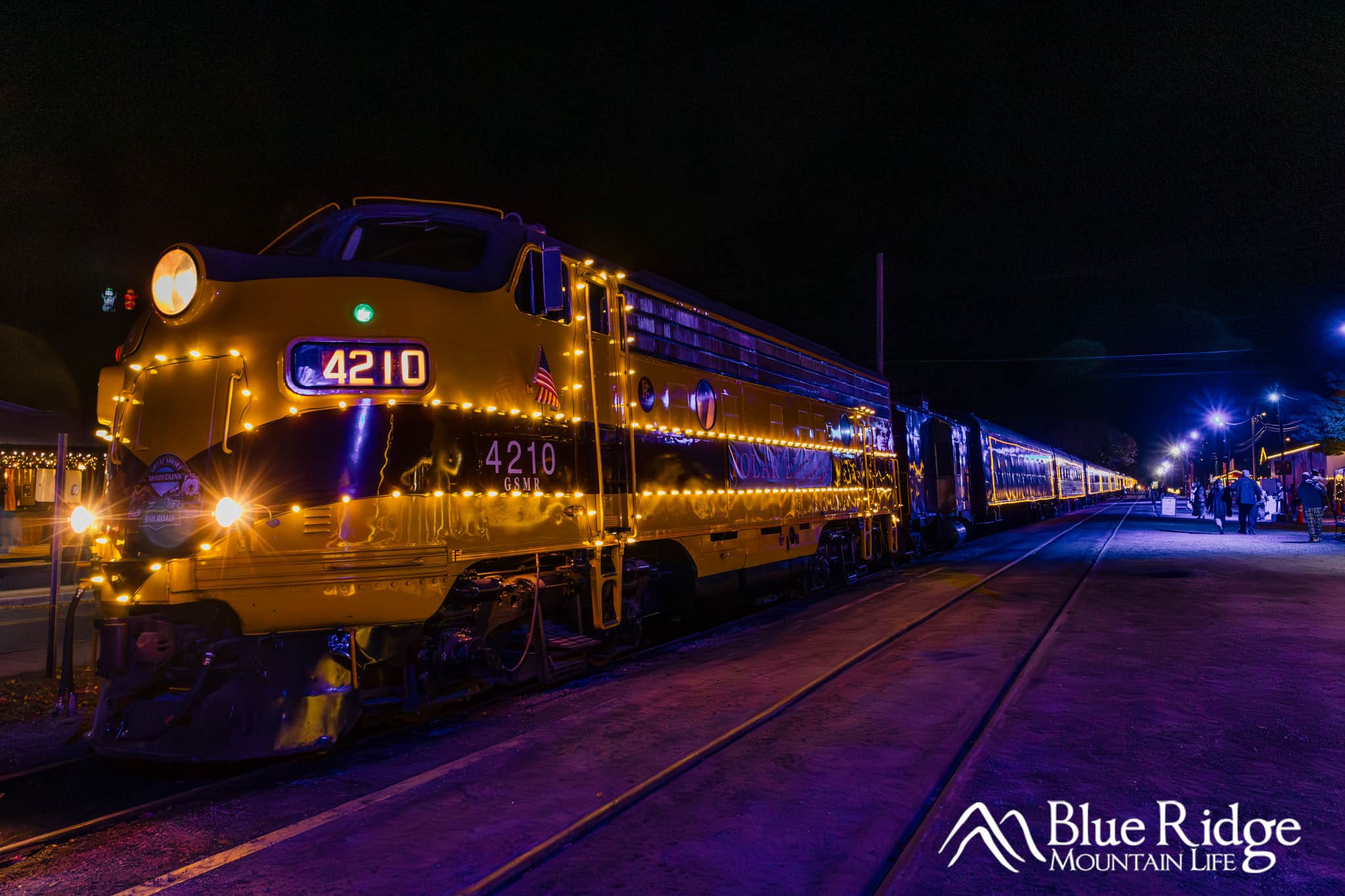 The Polar Express Bryson City NC Night time photo of the F-Series diesel engine decorated with Christmas lights for the Polar Express train ride.