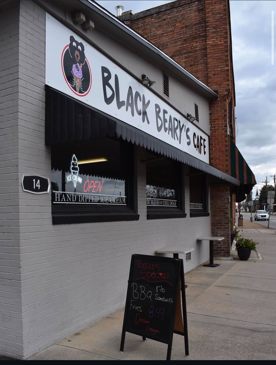 Black Beary's Cafe Old Fort, NC Exterior photo of their gray building with windows with a large sign saying "Black Beary's Cafe" above the 3 large windows.