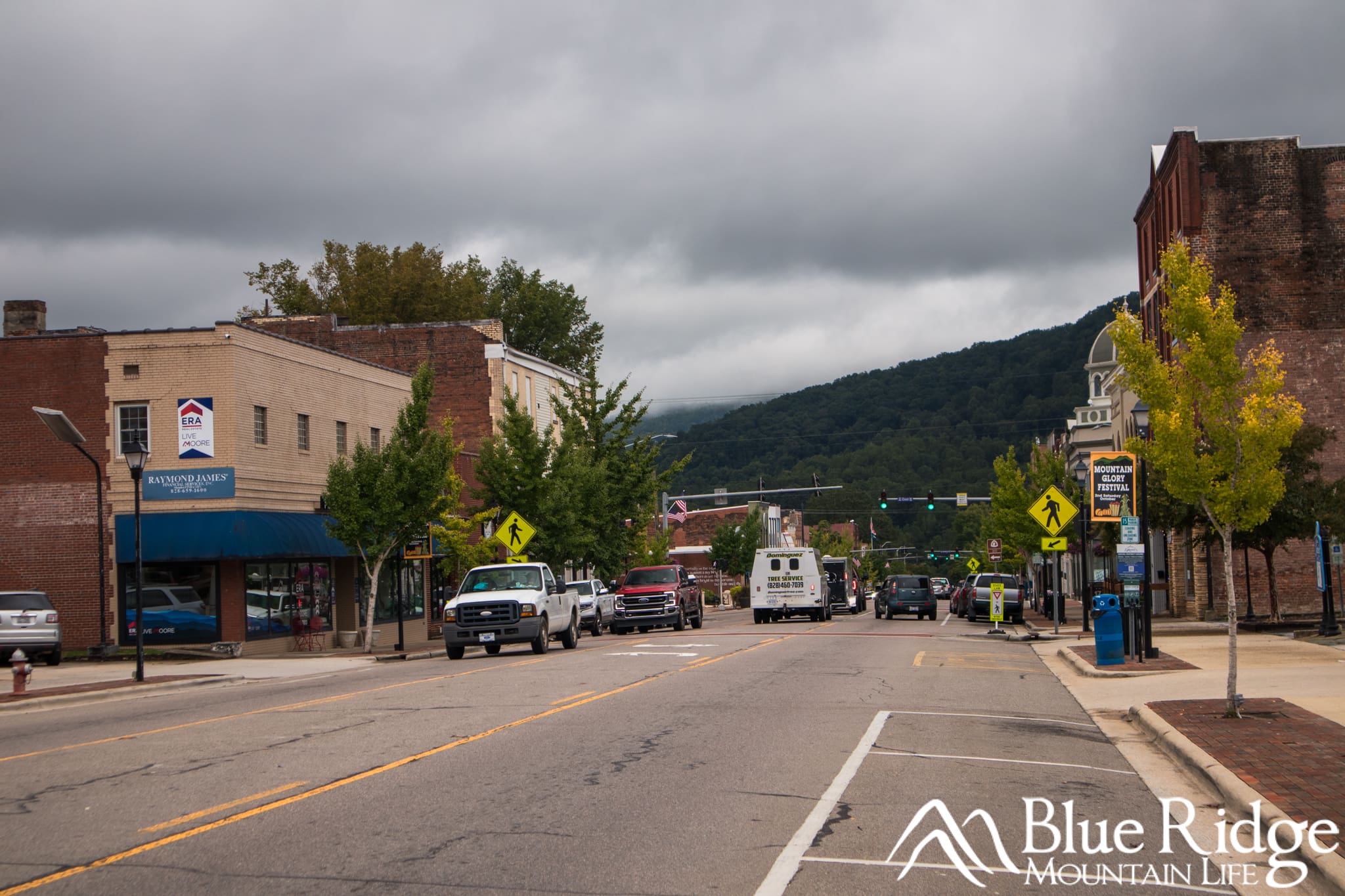 Shopping in Downtown Marion, NC Main street in downtown surrounded by historic old buildings and mountains in the background.