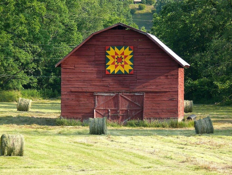 Haywood County Quilt Trail Haywood County Quilt Trail photo showing red barn with a quilt pattern on the front above the barn doors.